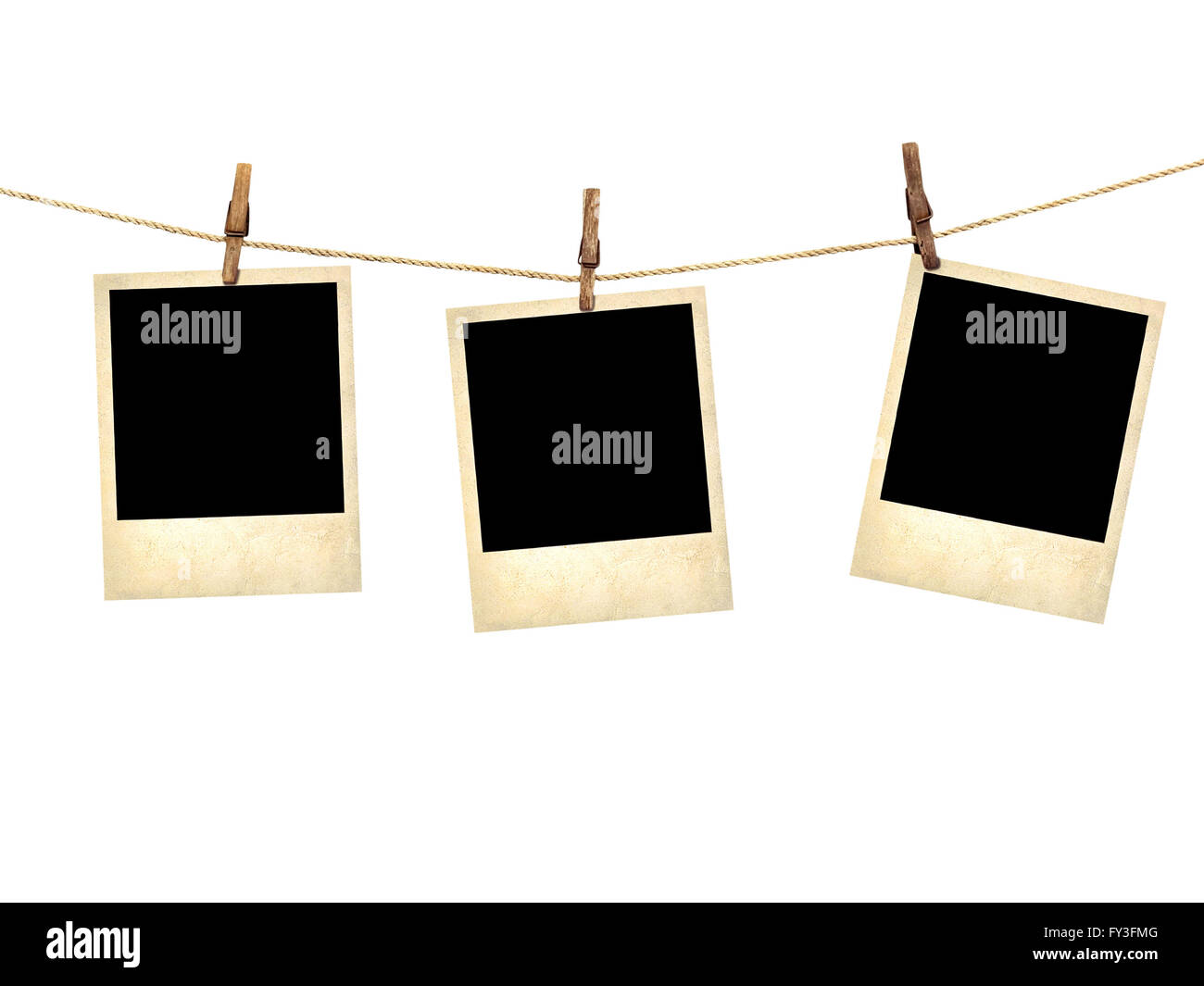 Old style photographs  hanging on a clothesline isolated on white background Stock Photo