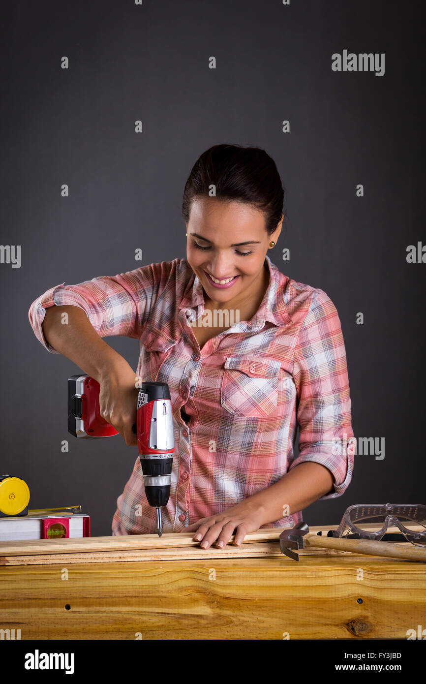 Female carpenter dark hair hi-res stock photography and images - Alamy