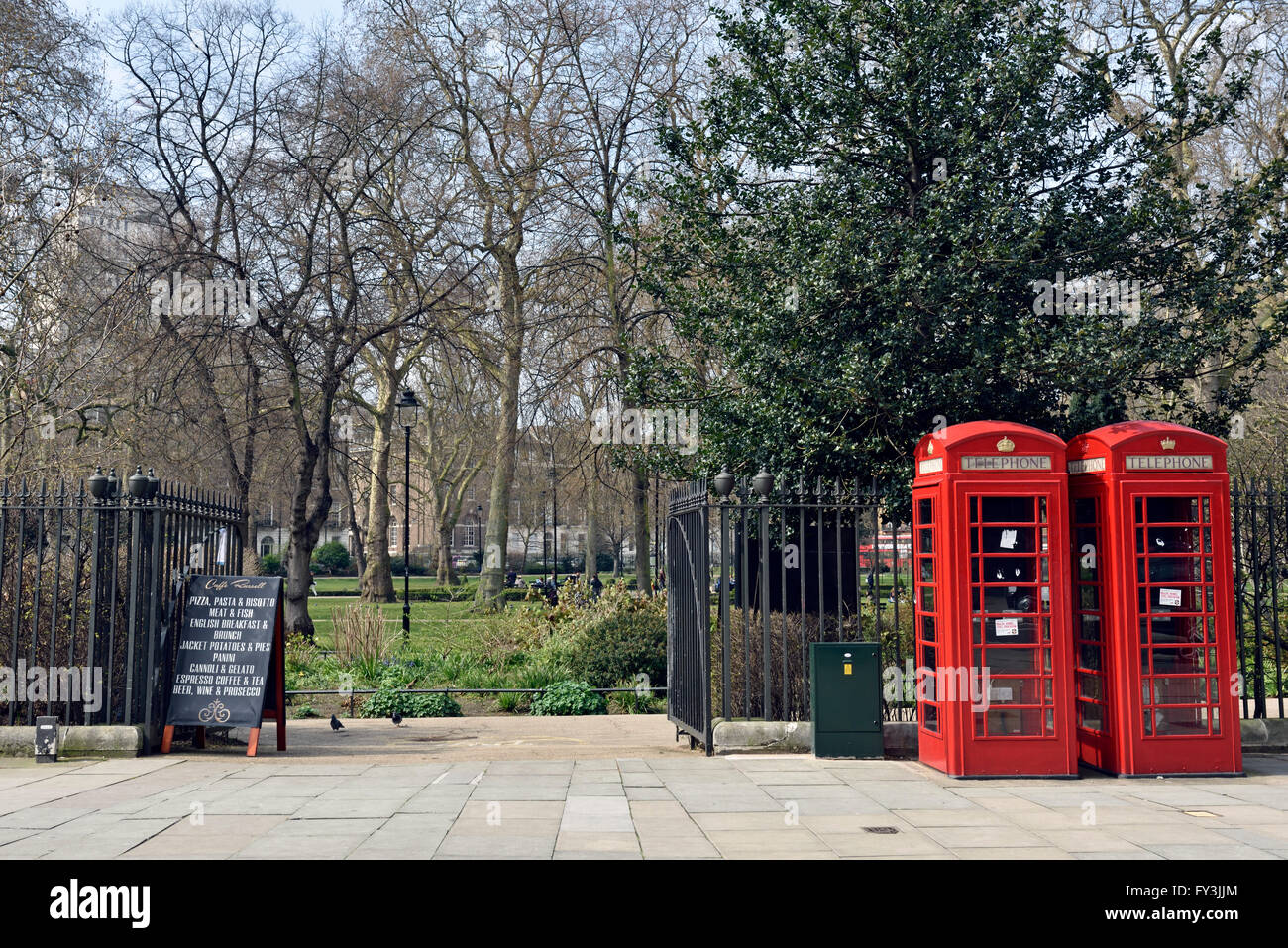 Entrance Russell Square with two red telephone boxes Bloomsbury London Borough of Camden England Britian UK Stock Photo