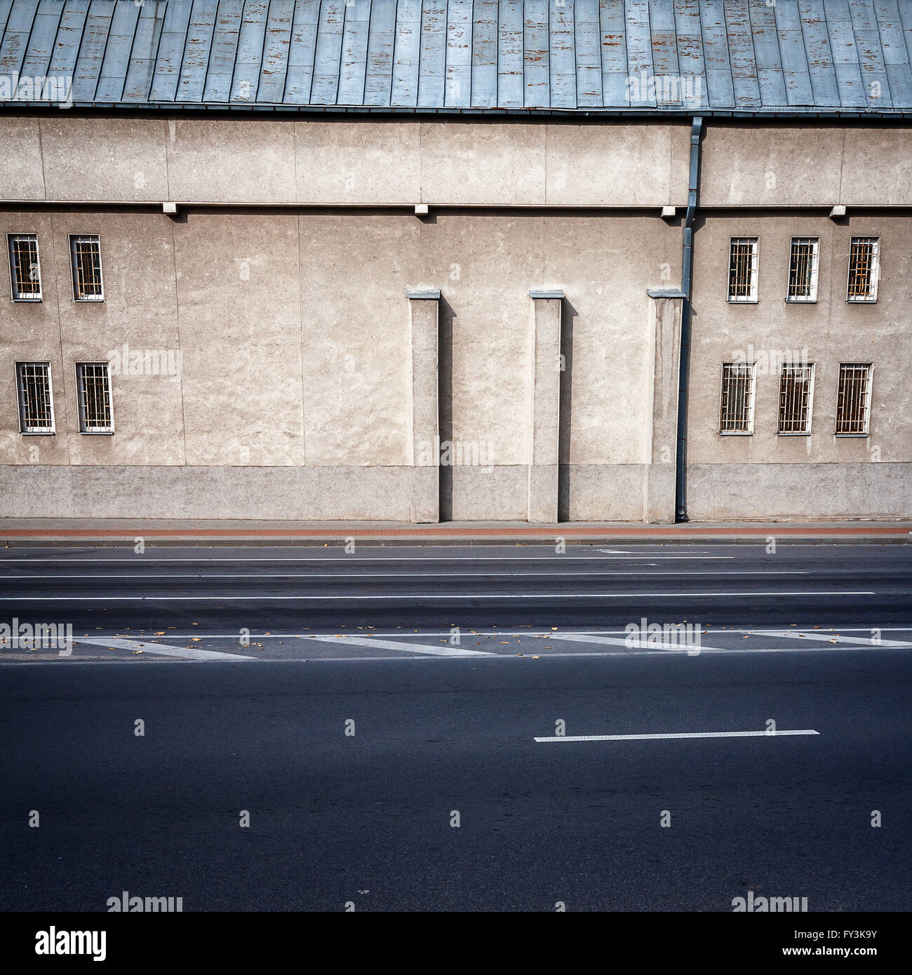 Picture of Aged weathered street wall with some windows Stock Photo - Alamy