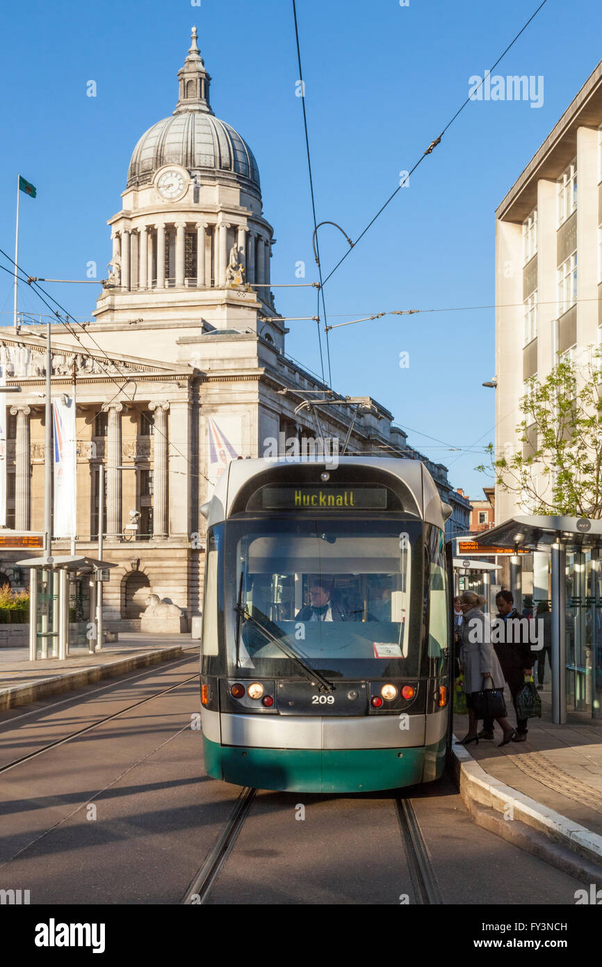The Nottingham tram (NET) in Nottingham city centre with the Council House in the background, Nottingham, England, UK Stock Photo