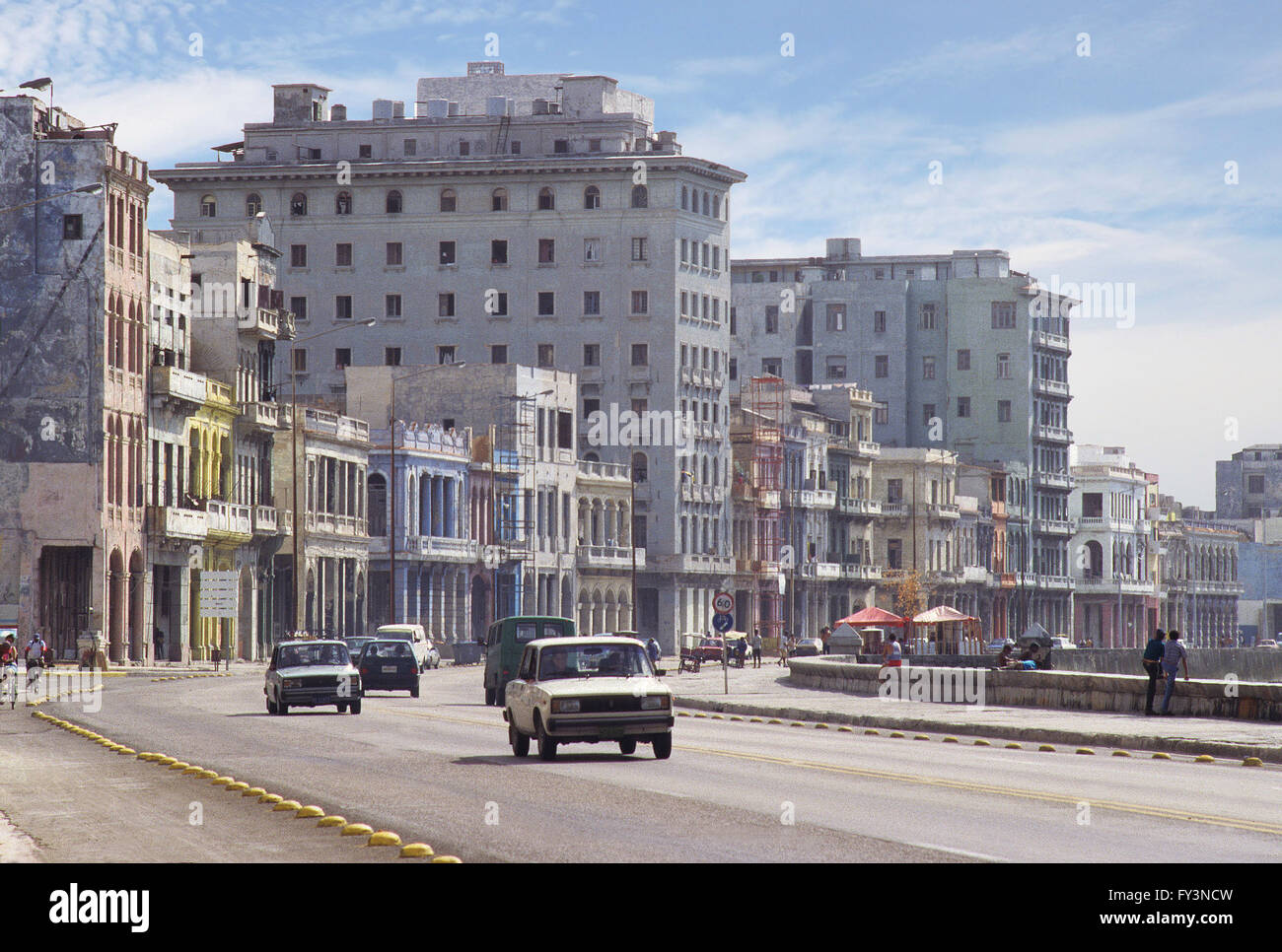 street scene with cars and pedestrians, Havana, Cuba Stock Photo