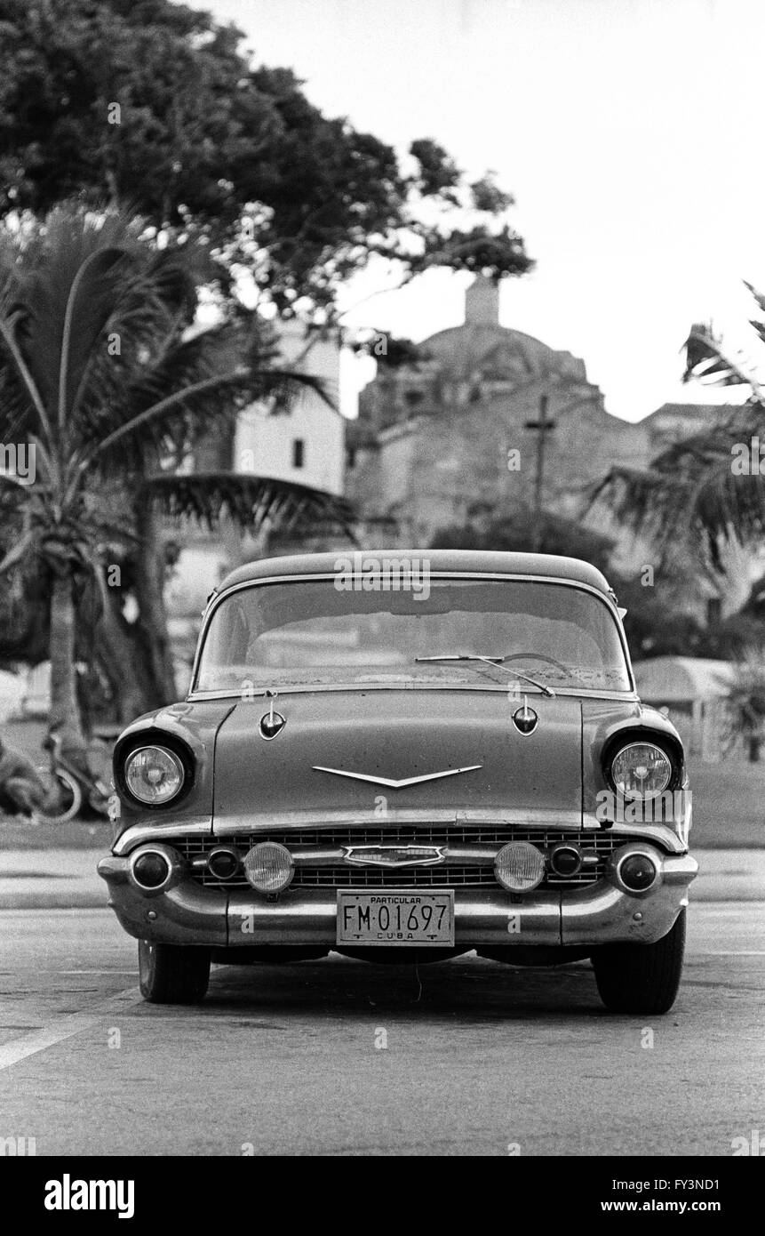 street scene with cars and pedestrians, Havana, Cuba Stock Photo