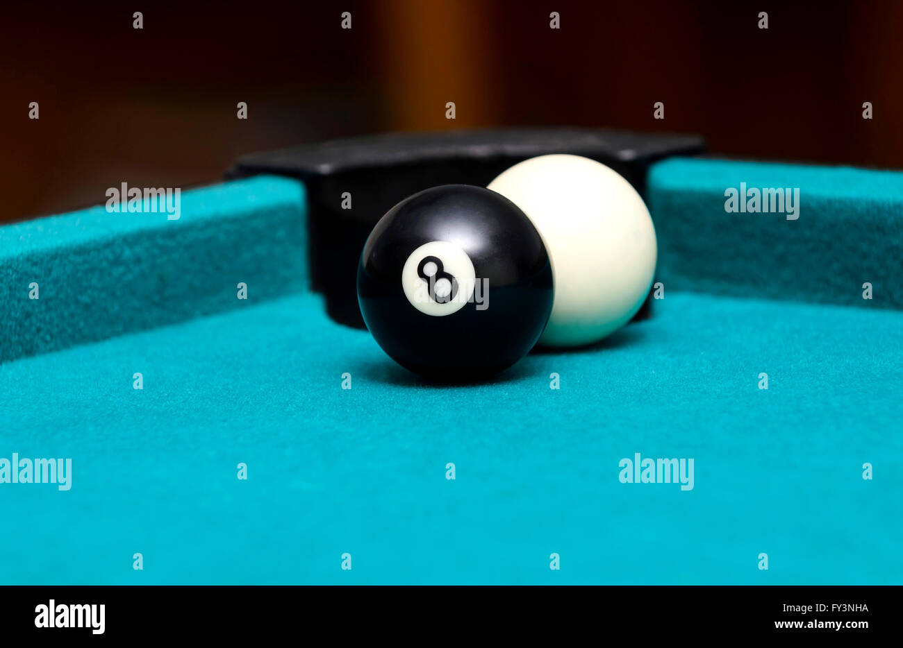 Eight ball and cue ball on pool table Stock Photo Alamy