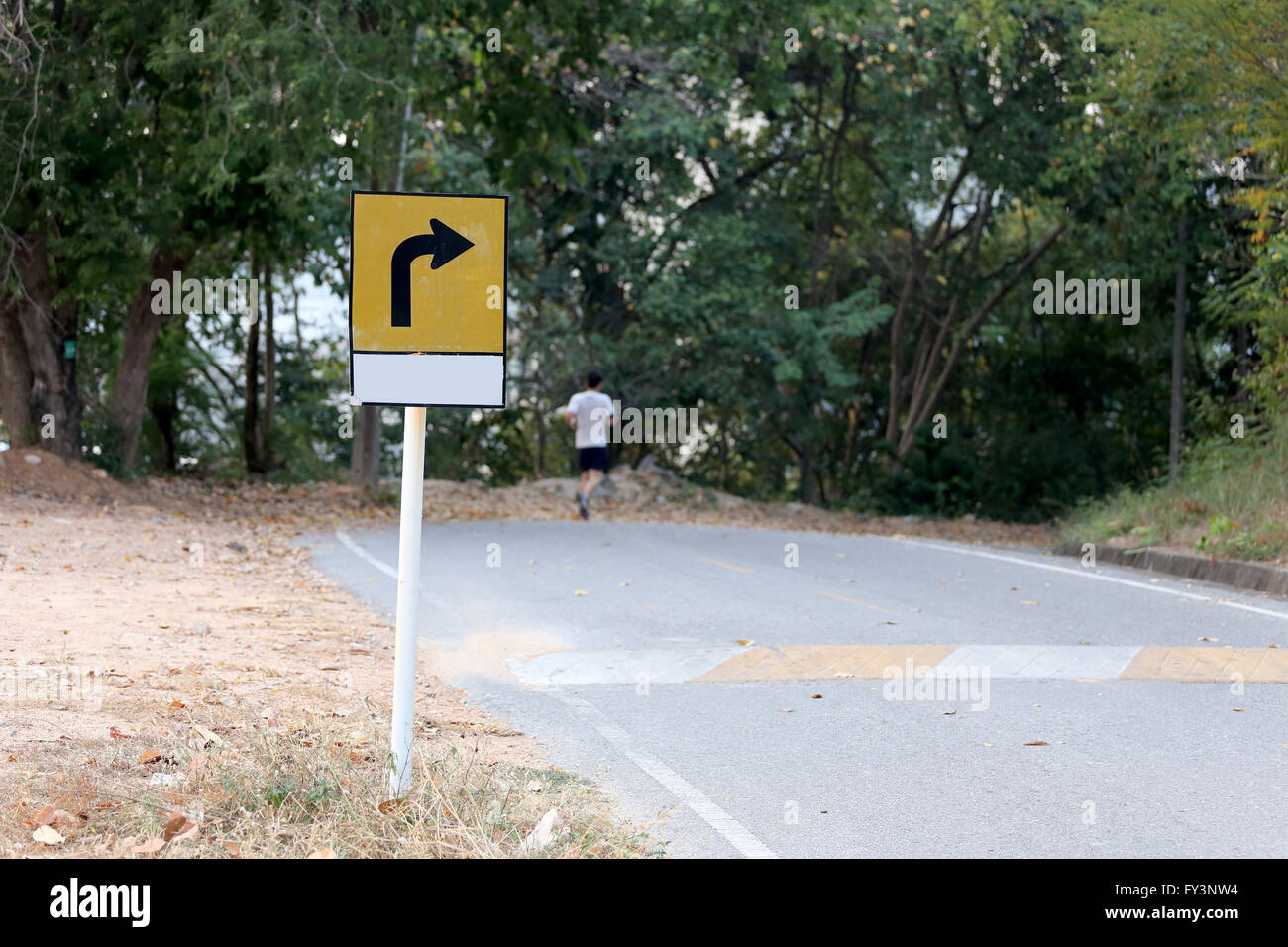 Warning signs for curves road,Street that traverses the mountain. Stock Photo