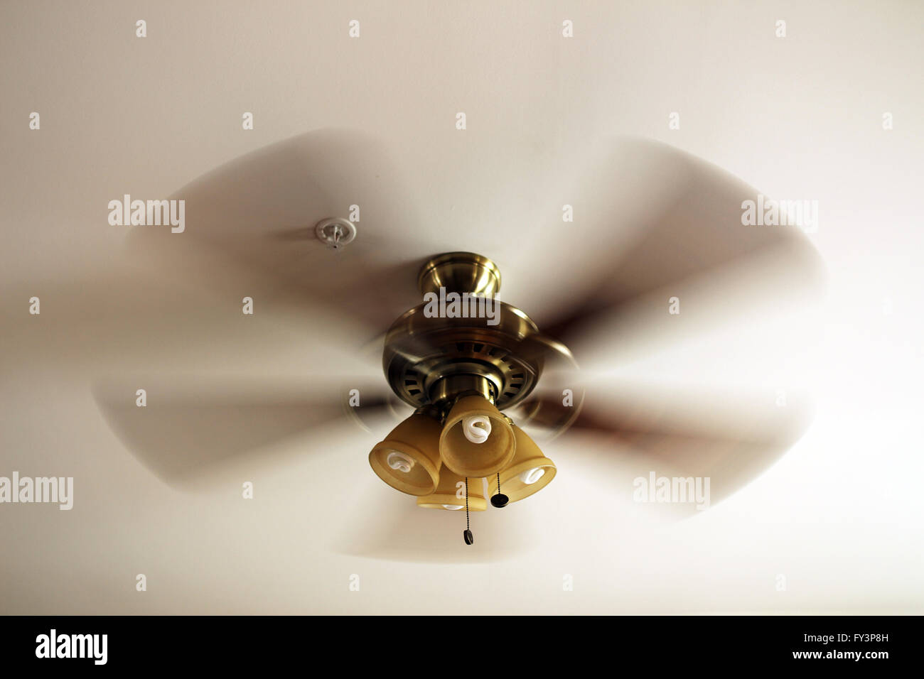 Moving ceiling fan Stock Photo