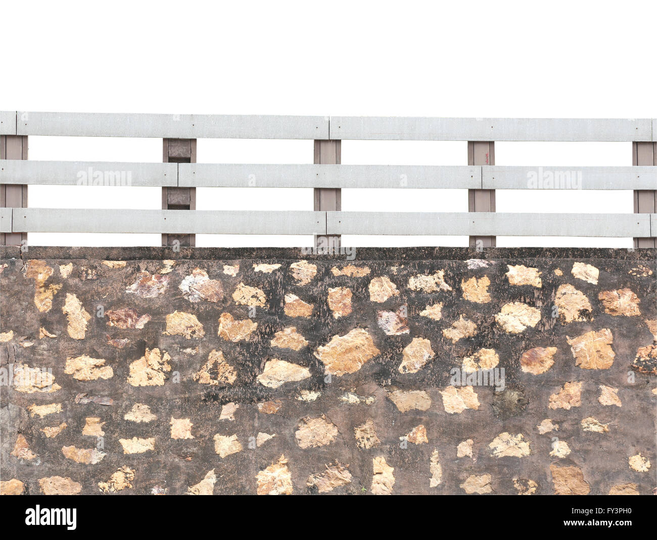 Stone walls and white wooden fence for design backdrop. Stock Photo