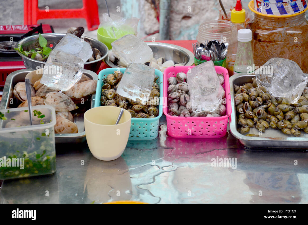 Fresh shell for cooking food vietnam style for sale people at street of Saigon city on January 22, 2016 in Ho Chi Minh, Vietnam Stock Photo