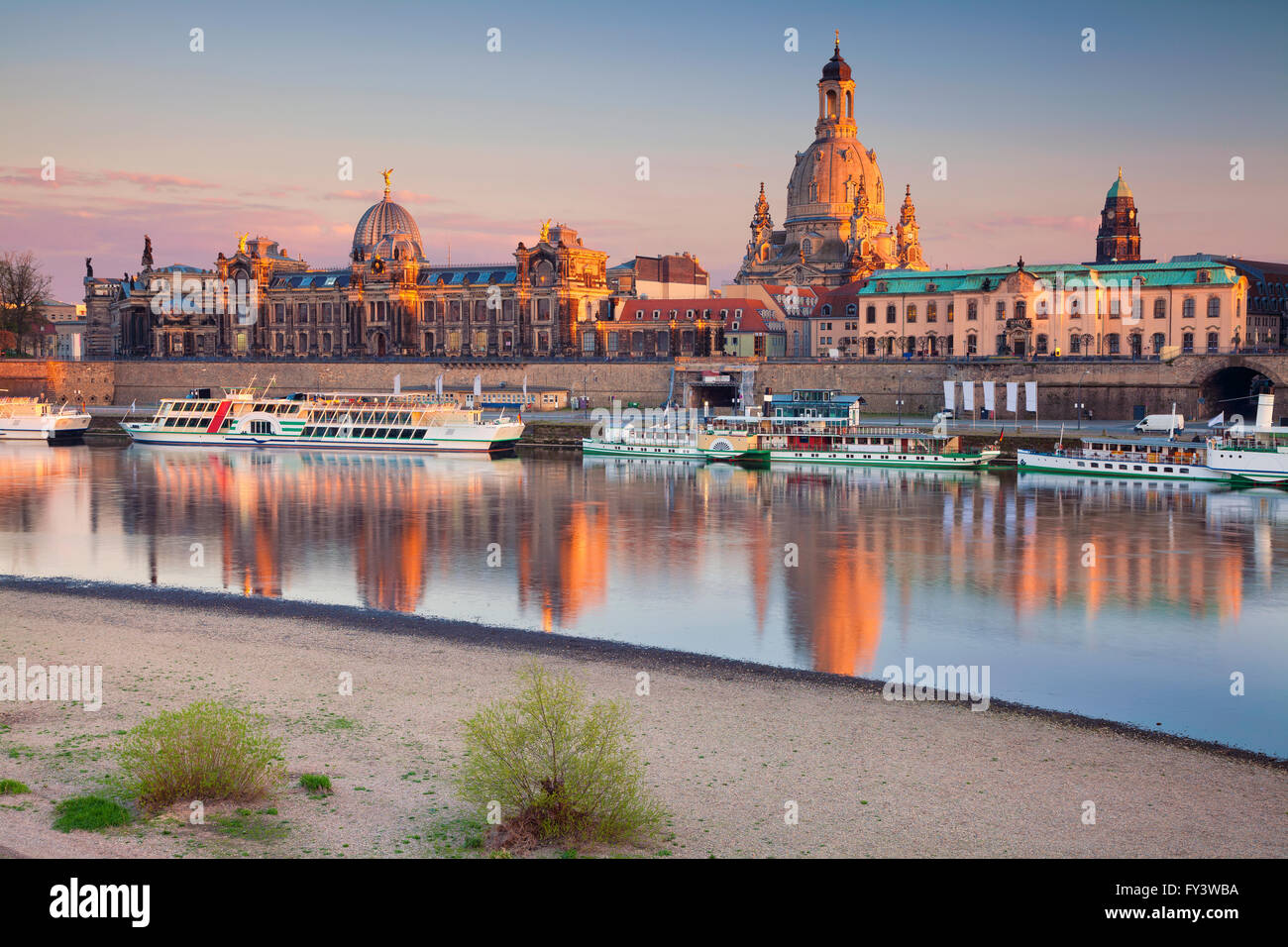 Dresden. Image of Dresden, Germany during sunset with Elbe River in the foreground. Stock Photo