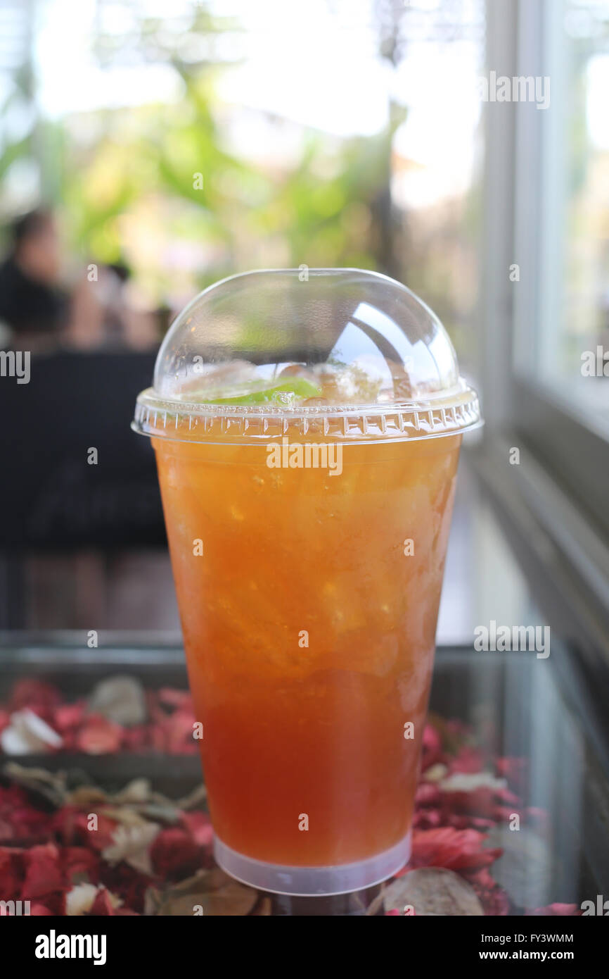 Cold lemon tea for reduces thirst water in the cafe. Stock Photo