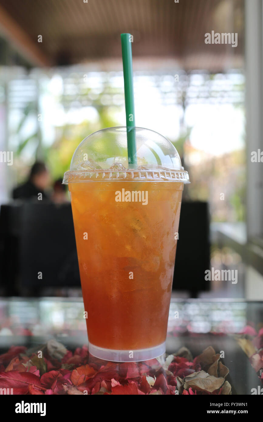 Cold lemon tea for reduces thirst water in the cafe. Stock Photo