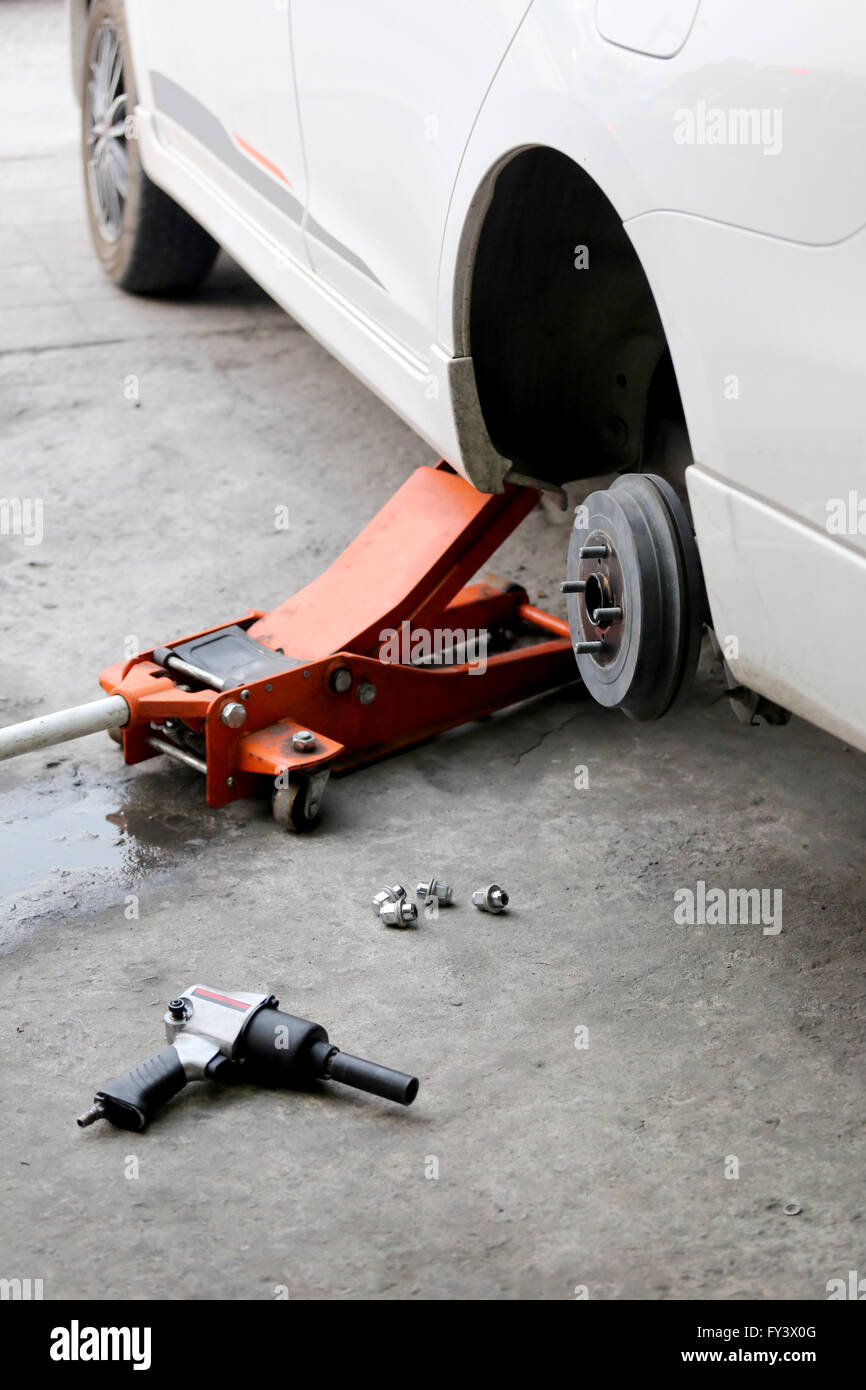 mechanic repaired wheeled vehicles in the garage Stock Photo Alamy