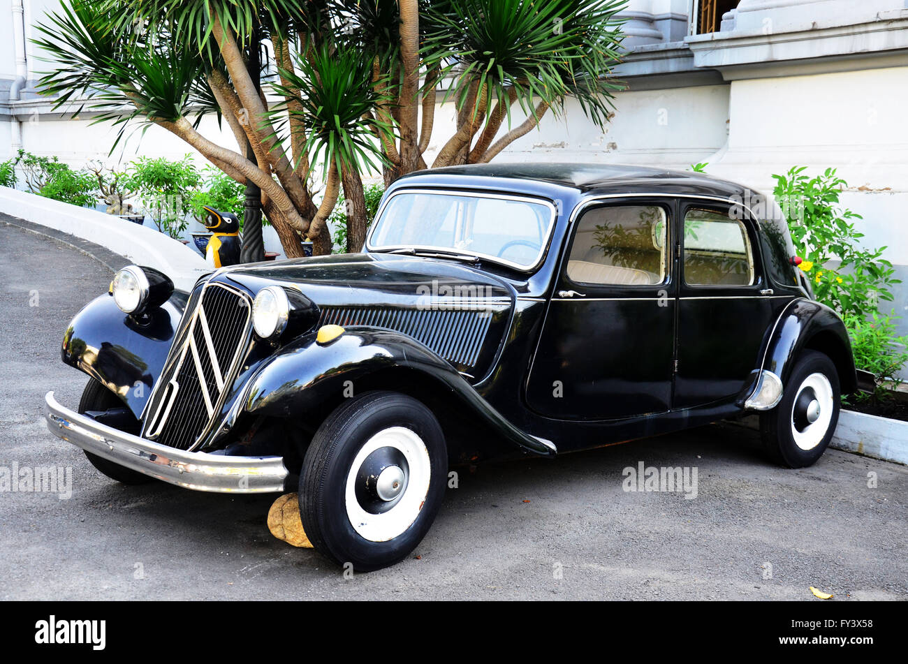 Ancient classic car for show at front of Ho Chi Minh City Museum on