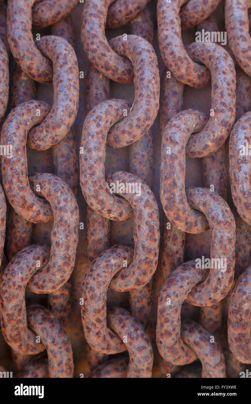 Links of a rusty chain on Lydney Harbour, Lydney, Gloucestershire, UK Stock Photo