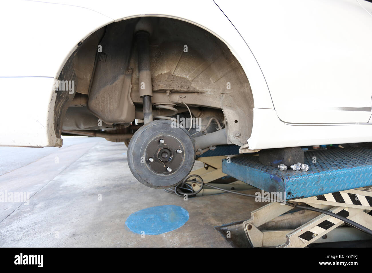 Wheel hub of a car in repair of the damage,Garage shop Stock Photo Alamy