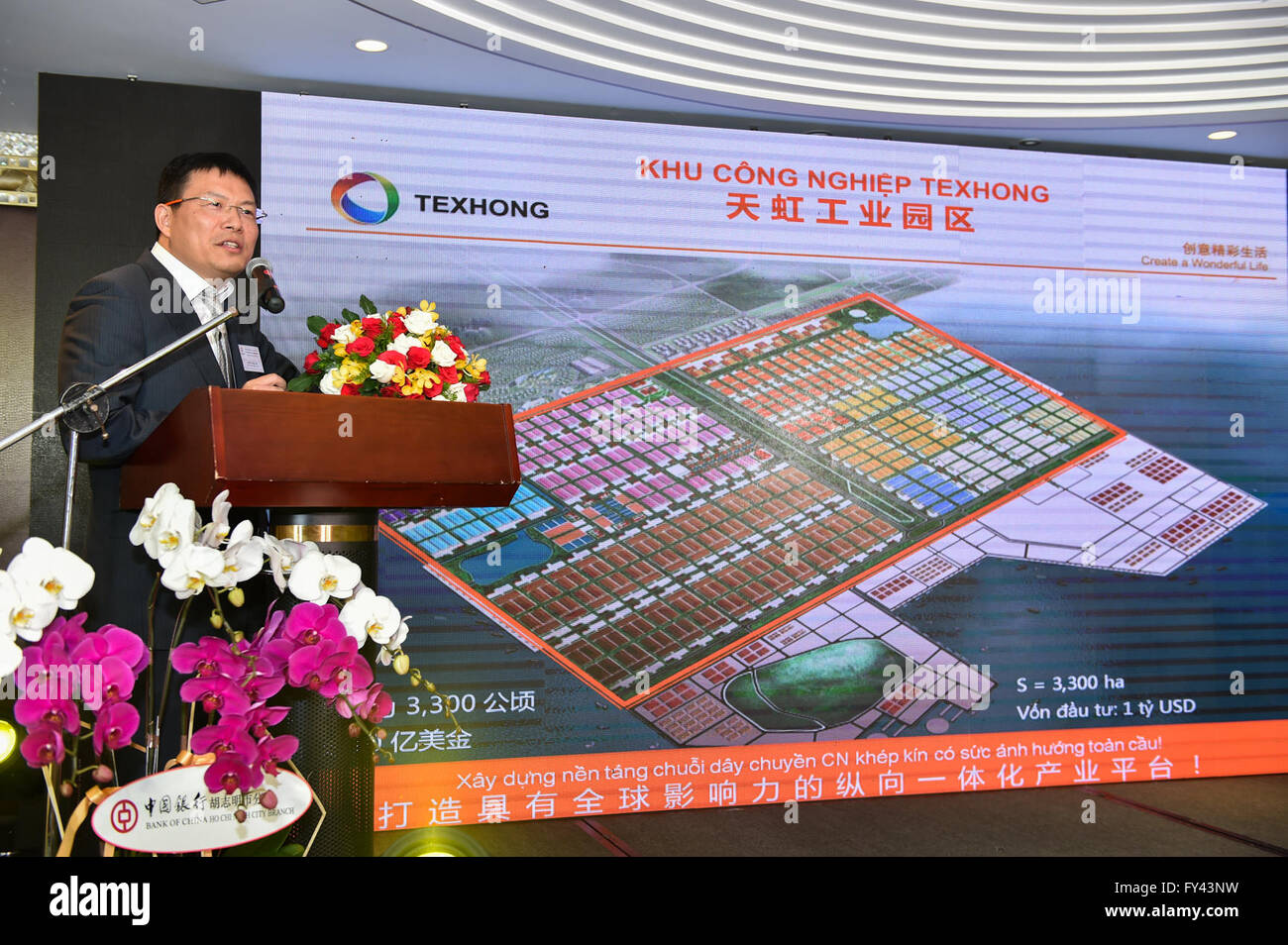 Ho Chi Minh City, Vietnam. 20th Apr, 2016. Chairman of Texhong Textile Group Limited - Texhong (China) Investment Company Hong Tianzhu delivers a speech during the signing ceremony in Ho Chi Minh City, Vietnam, on April 20, 2016. Bank of China's (BOC) Ho Chi Minh City Branch signed here Wednesday a 103-million U.S. dollar syndicated loan for a Vietnam-based subsidiary of leading Chinese yarn manufacturer Texhong Textile Group, partly helping foster the good investment and trade relations between the two countries. © Nguyen Le Huyen/Xinhua/Alamy Live News Stock Photo