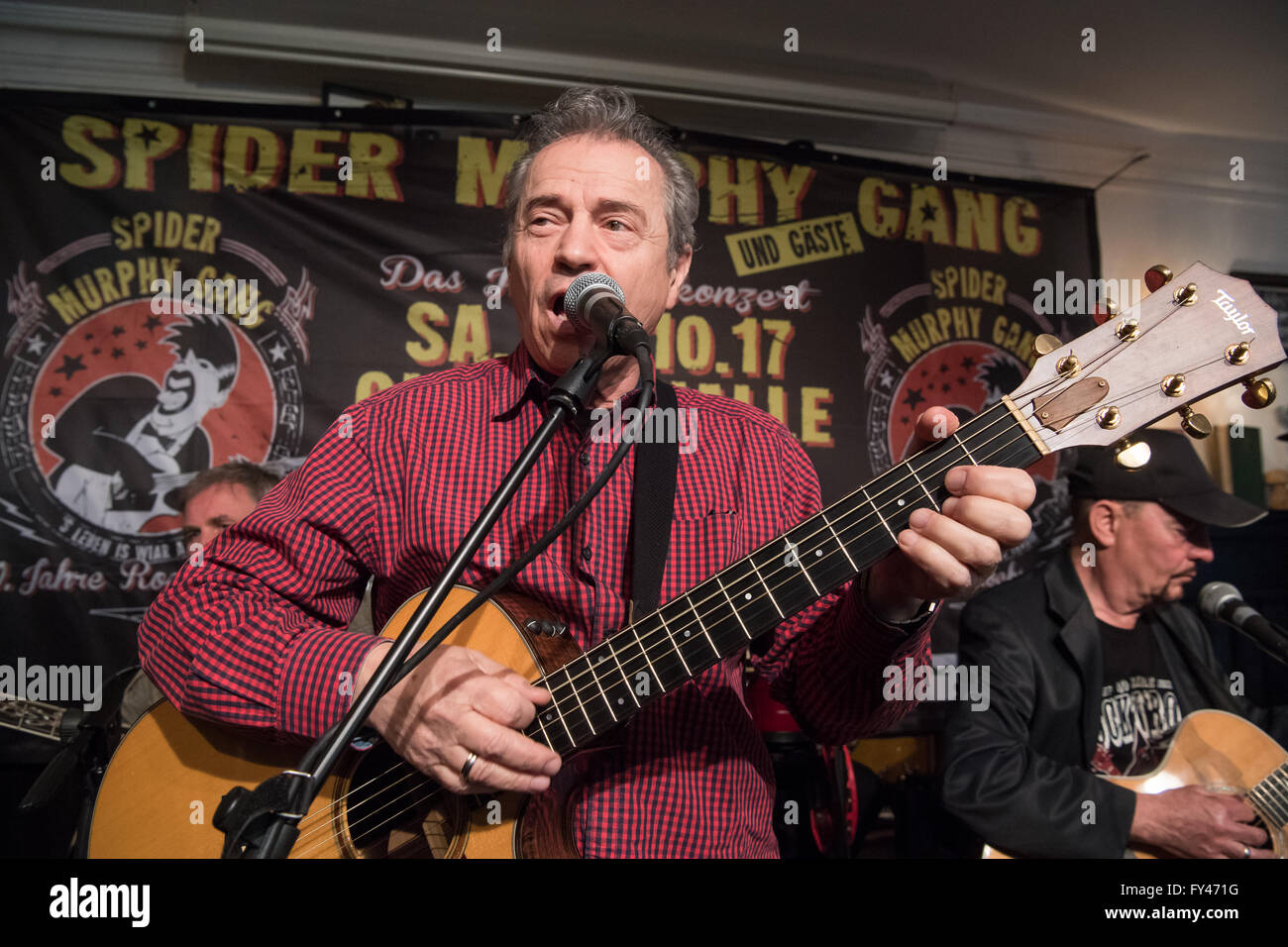 Munich, Germany. 21st Apr, 2016. The founder of the Spider Murphy Gang, Guenther Sigl, and other band members play ahead of a press conference on the 40th anniversary of the 1980s cult band 'Spider Murphy Gang' in Munich, Germany, 21 April 2016. Photo: PETER KNEFFEL/dpa/Alamy Live News Stock Photo