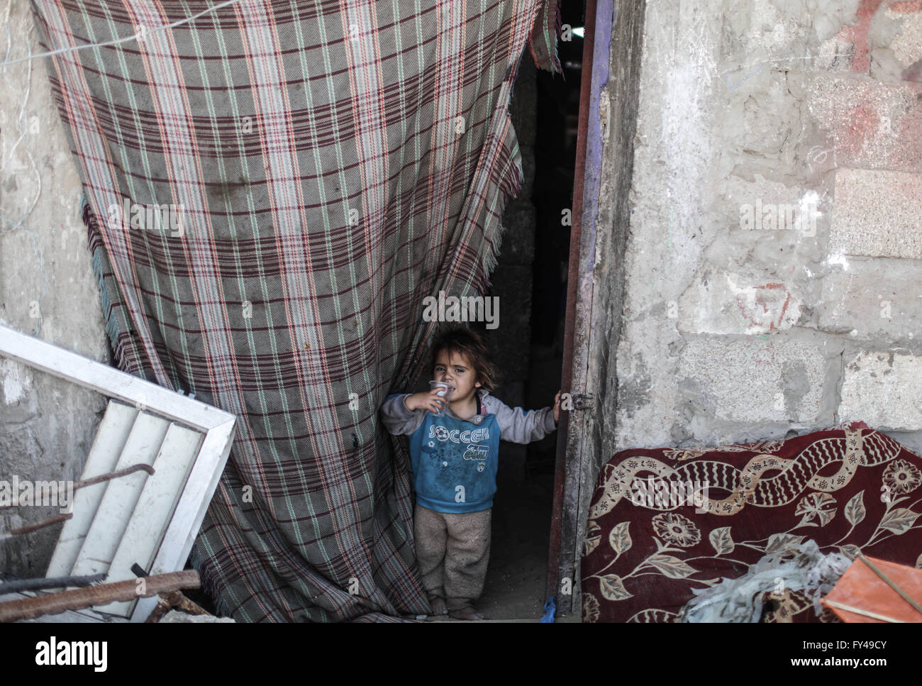 Gaza. 21st Apr, 2016. A Palestinian girl stands in front of her house ...