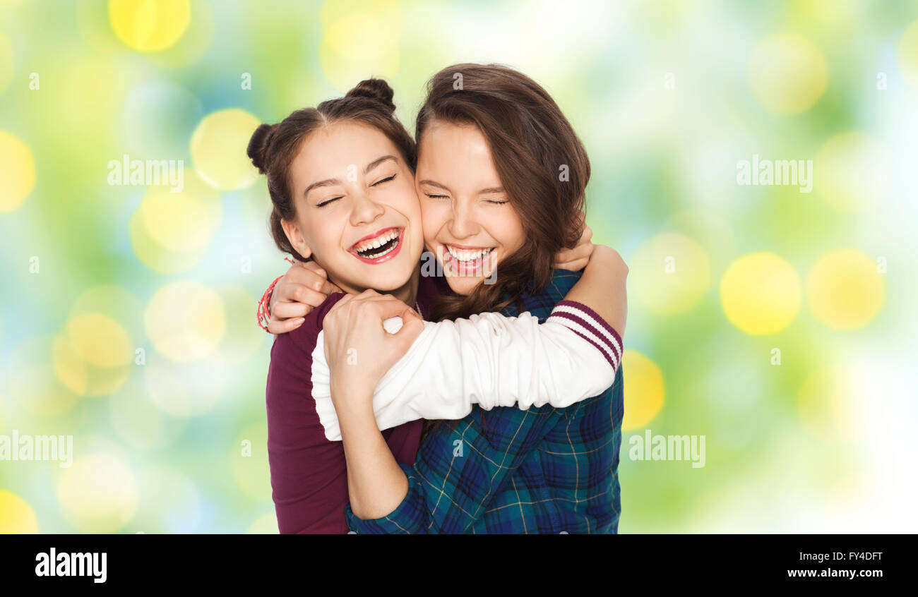 happy smiling pretty teenage girls hugging Stock Photo - Alamy