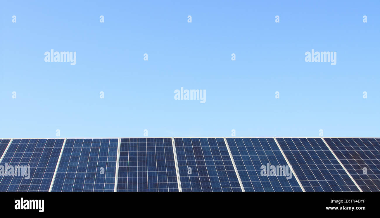 Solar panels over blue sky Stock Photo