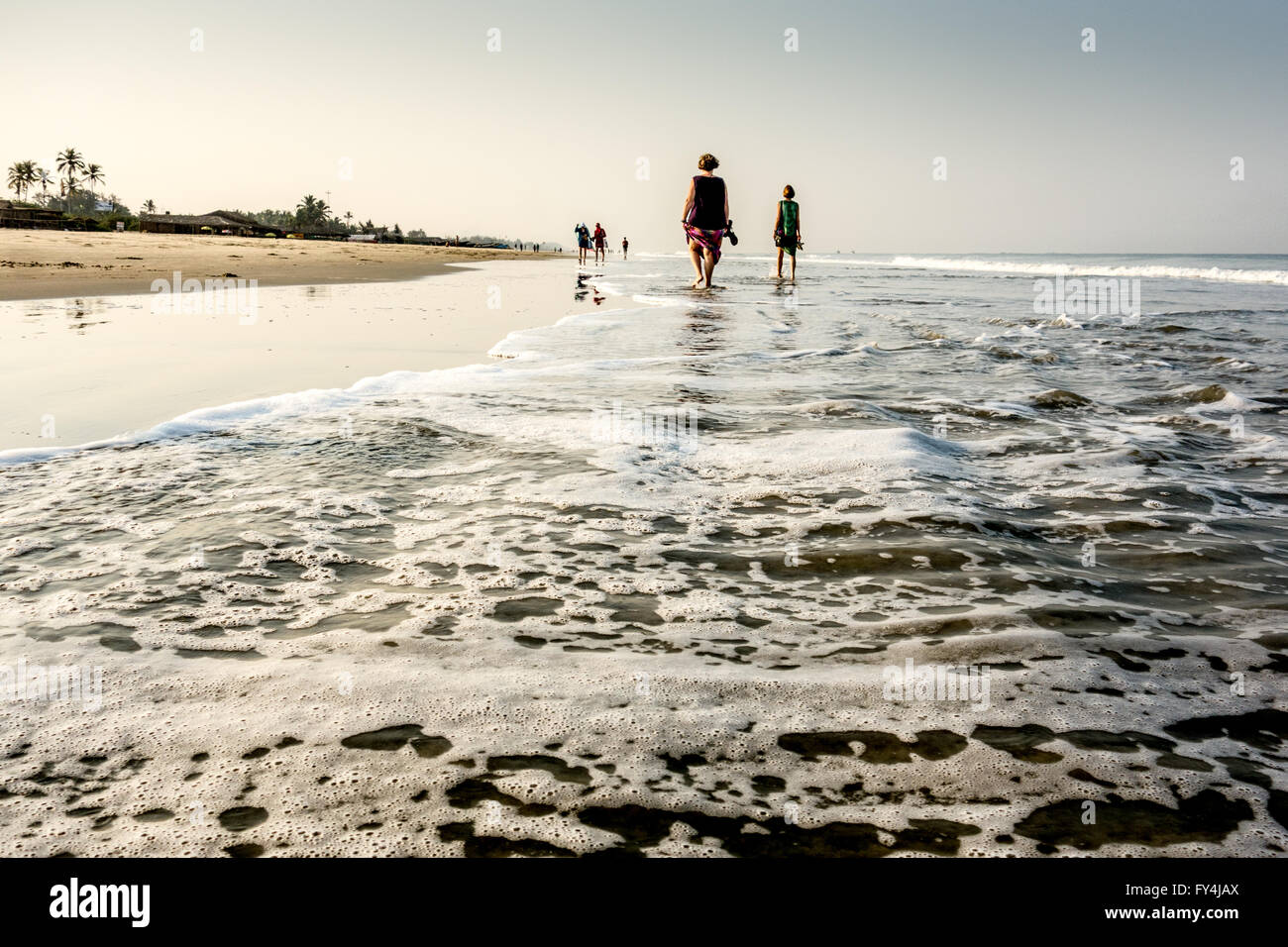 Seniors on a beach in Goa, India Stock Photo