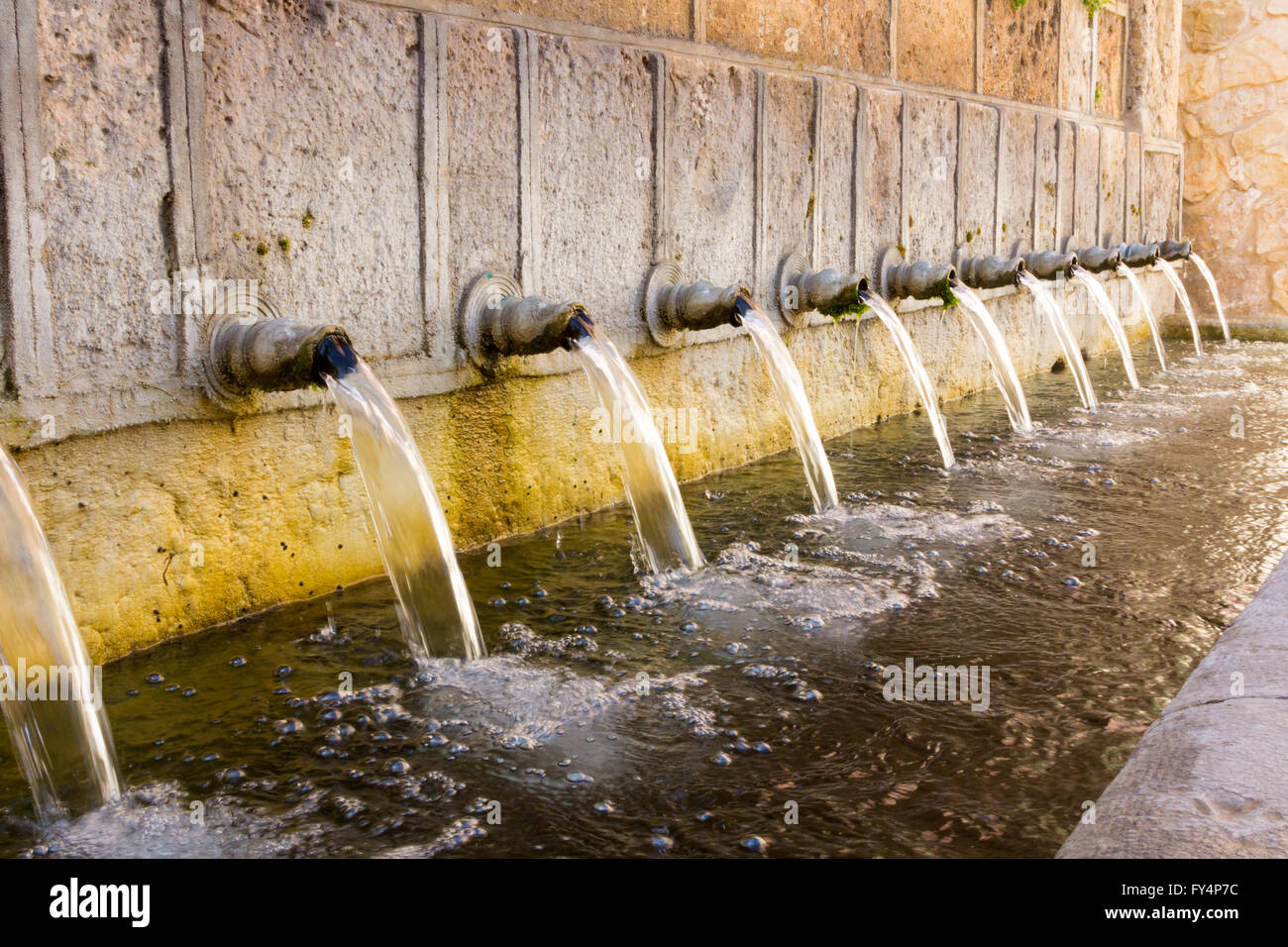 ancient water fountain water pipes Stock Photo