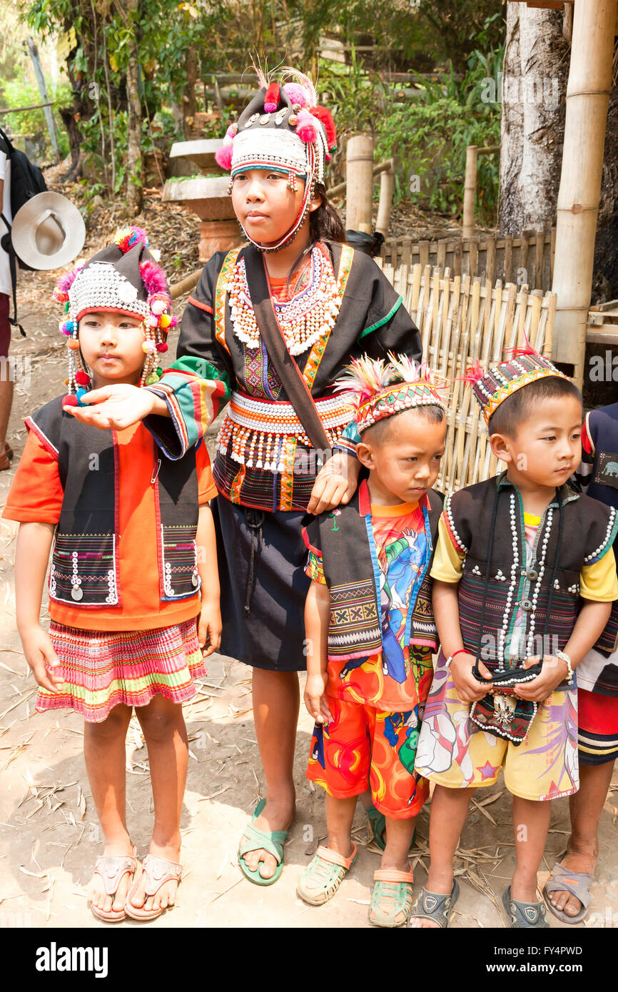 Traditionally dressed kids from the Akha people, hill tribe, ethnic ...