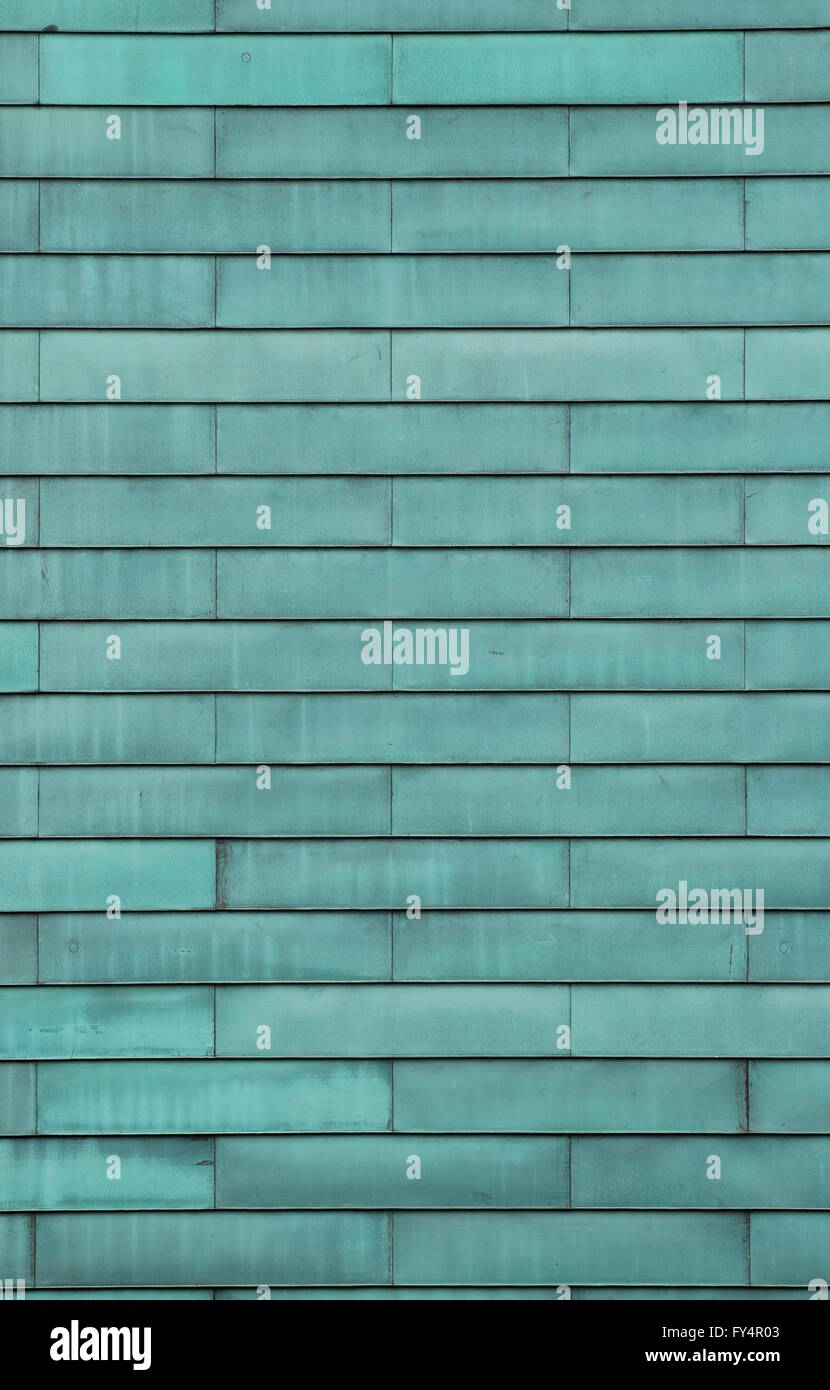 Rows of green metal panels usable as background or texture. Stock Photo