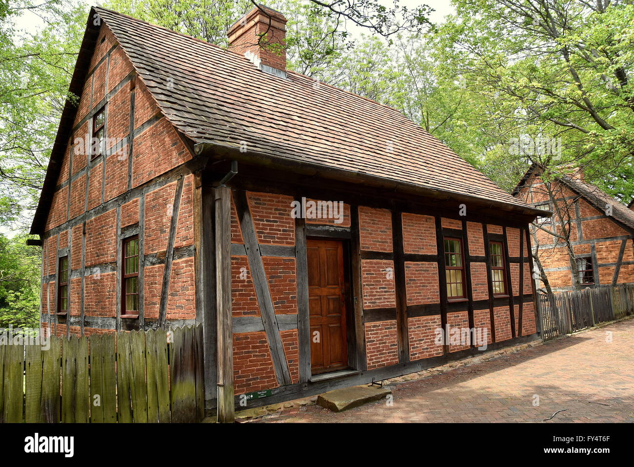 Old Salem, North Carolina  1767 Moravian Third House constructed of brick and half-timber on Main Street Stock Photo