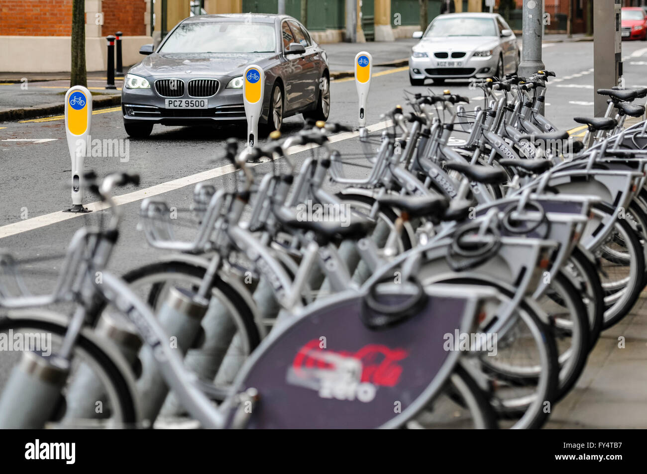 Row of bollards separating a cycle lane from motor vehicles. Stock Photo
