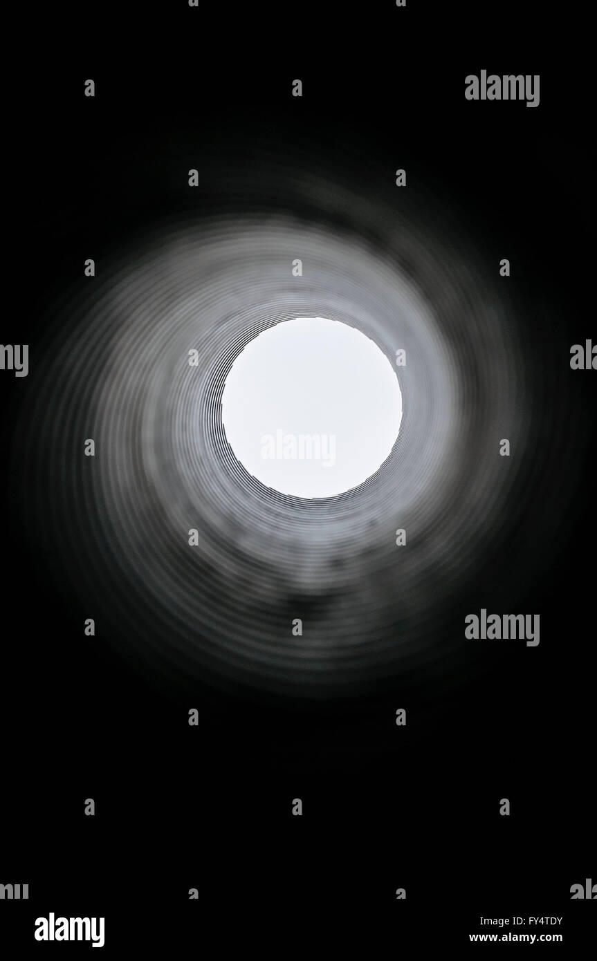 View through the barrel of a 105mm Light Field Gun Howitzer showing spiral rifling which spins the shell and improves accuracy Stock Photo