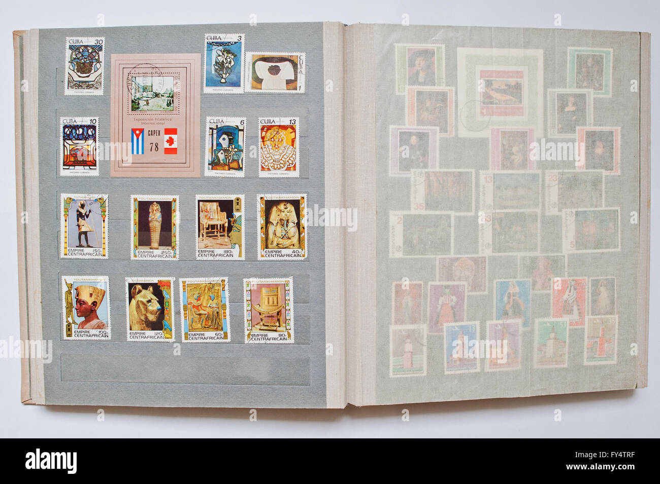Collection of postage stamps in album printed from Cuba and Central African Republic Stock Photo