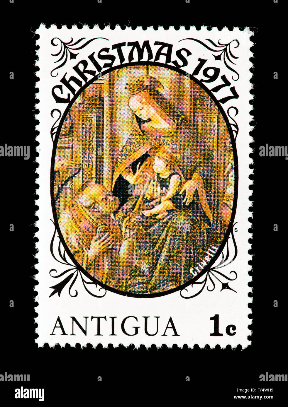 Postage stamp from Antigua depcting a Carlo Crivelli  painting of the Virgin and Child, Christmas, 1977. Stock Photo