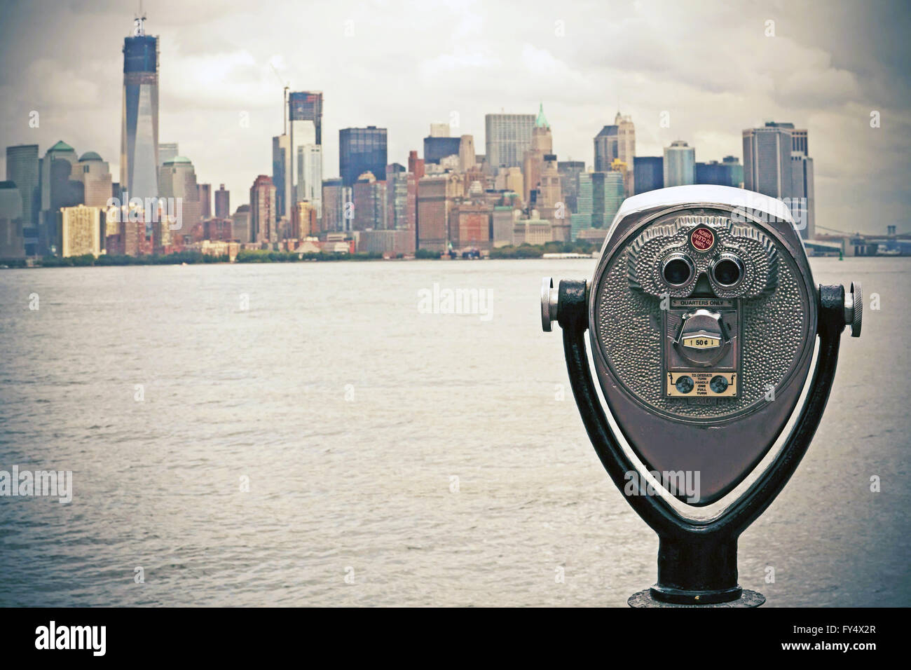 Coin operated binoculars with Lower Manhattan on the background (New