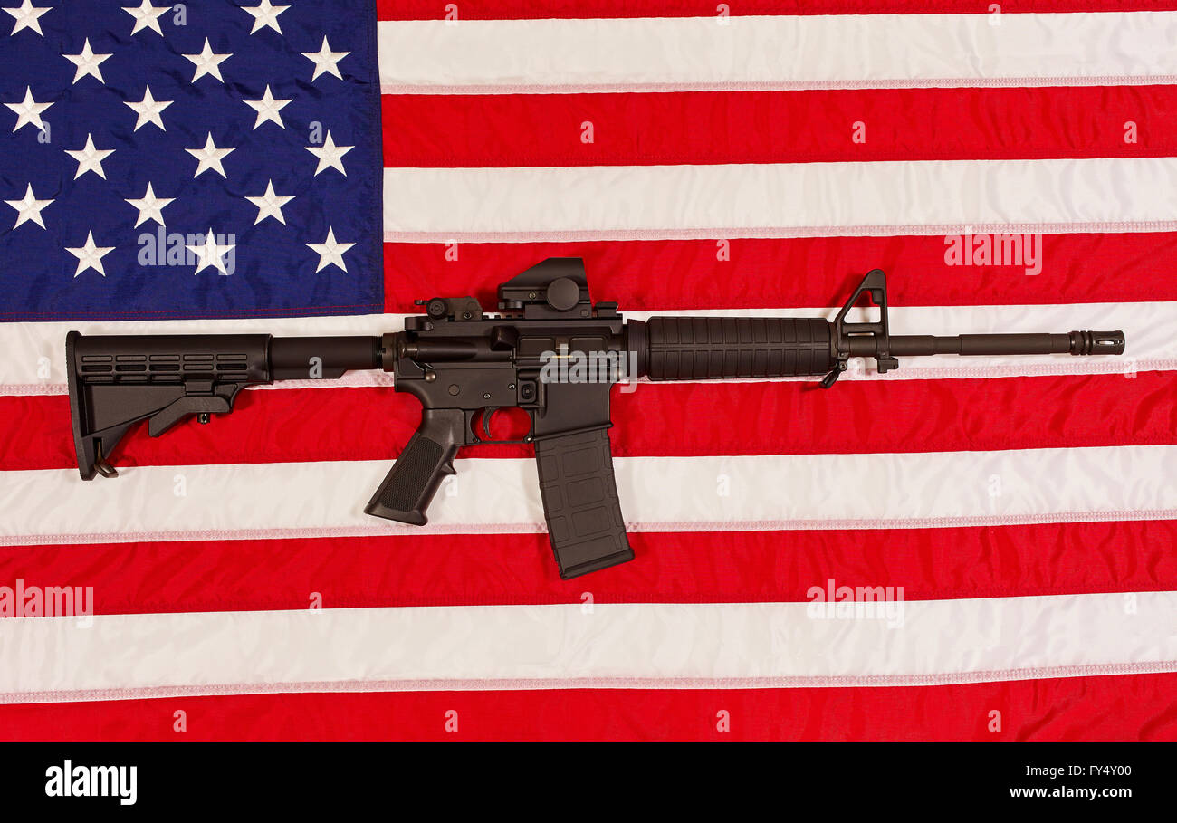 AR15 M4A1 M16 Style Weapon Automatic Rifle with USA Flag concept freedom justice patriotism Stock Photo
