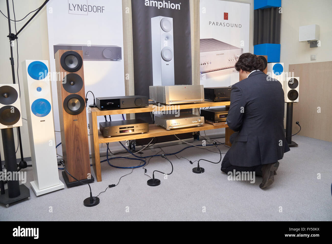 Moscow Hi Fi and High End Show, Moscow, Russia - April 15, 2016: Representative of the distribution company tunes High End audio Stock Photo