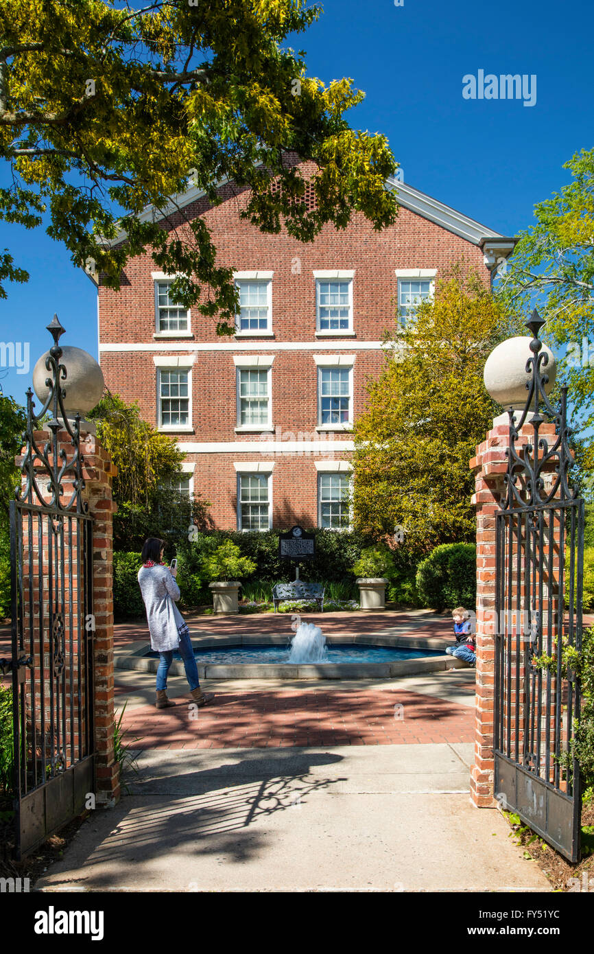 Mom taking photo of son in front of 'Old College' (b. 1806), the first permanent building on the University of Georgia Campus, A Stock Photo