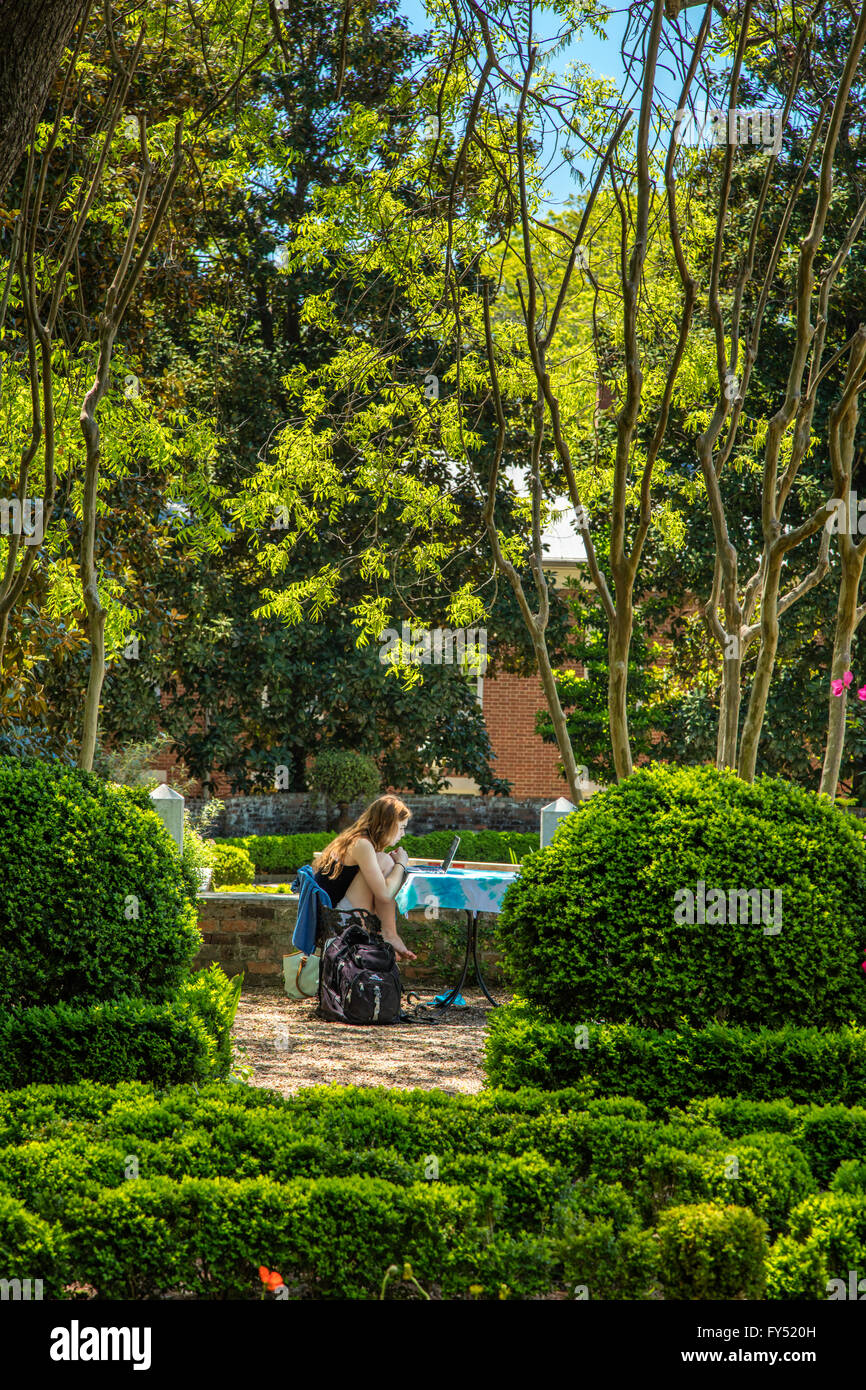 Female student at Founders Memorial Garden on University of Georgia Campus, Athens, Georgia, USA Stock Photo