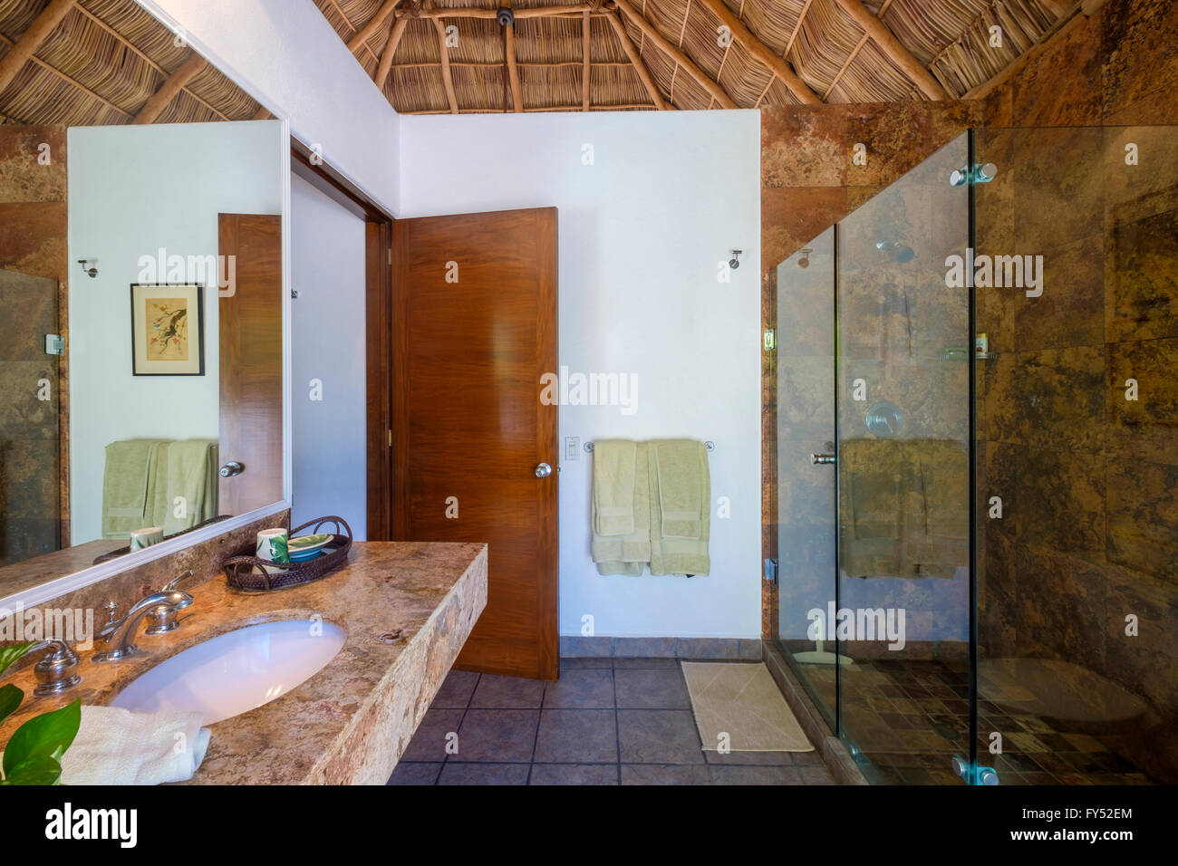 Bathroom in upscale Mexican Residence with palapa roof, Punta de Mita, Riviera Nayarit, Mexico Stock Photo