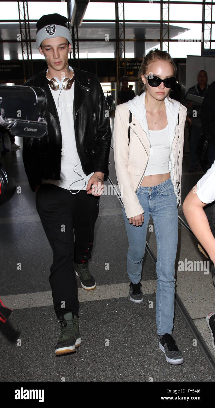 Lily Rose Depp, boyfriend Ash Stymest, brother John Depp, and mother  Vanessa Paradis arrive at Los Angeles International Airport Featuring: Lily  Rose Depp, Ash Stymest Where: Los Angeles, California, United States When:
