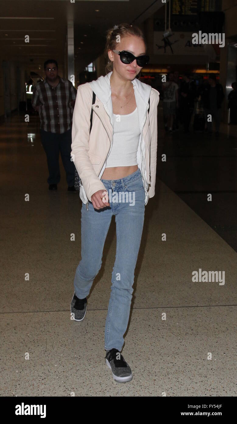 Lily Rose Depp, boyfriend Ash Stymest, brother John Depp, and mother Vanessa Paradis arrive at Los Angeles International Airport  Featuring: Lily Rose Depp Where: Los Angeles, California, United States When: 22 Mar 2016 Stock Photo