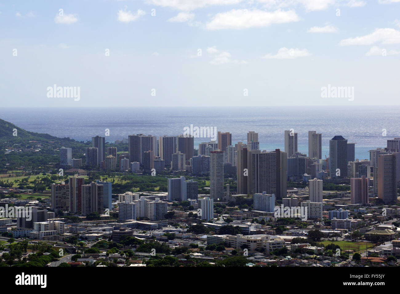 Aerial of  Honolulu, Diamond Head, Waikiki, Buildings, parks, hotels and Condos with Pacific Ocean stretching into the distance Stock Photo