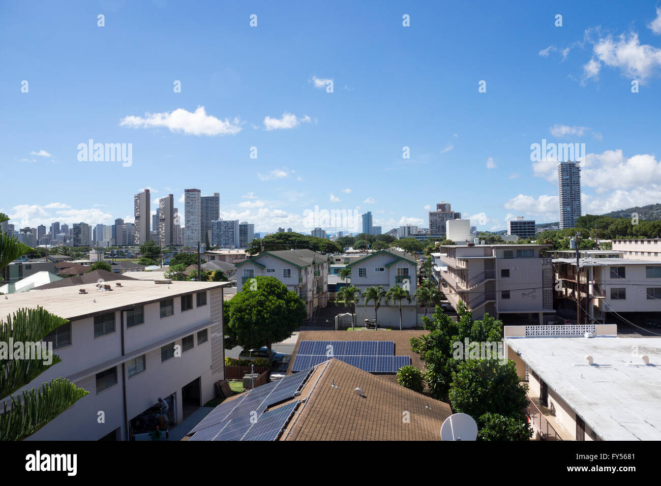 Kapahulu town in Honolulu with homes, condos, and mountain of Tantalus on a clear day on Oahu, Hawaii. Stock Photo