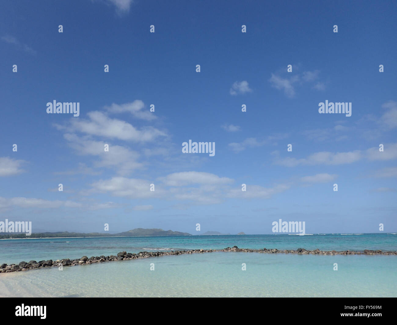 Pahonu Pond (Ancient Hawaiian Fishpond) with Shallow wavy ocean waters