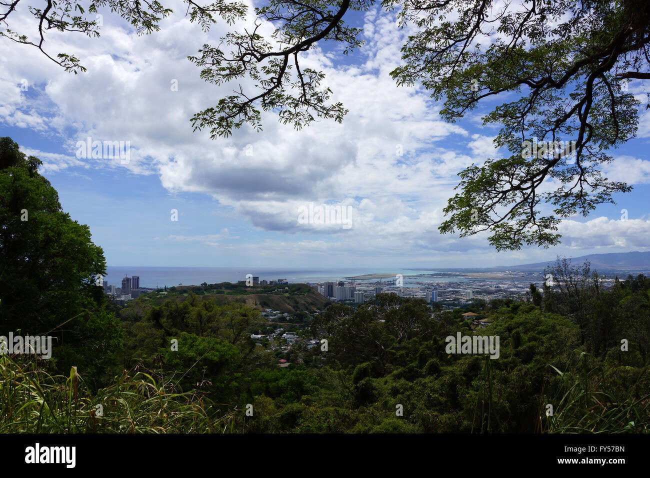 Punchbowl Crater, Nuuanu, Airport, Kalihi, Harbor and Honolulu Cityscape looking to the ocean from high up in the hills with hou Stock Photo
