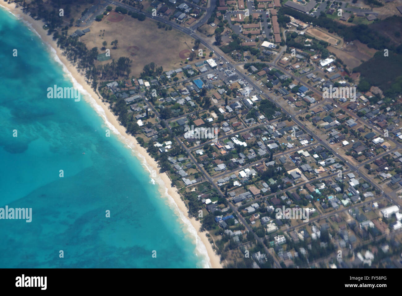 Aerial view of Waimanalo Beach, Homes, bay. Highway, Park and Pacific