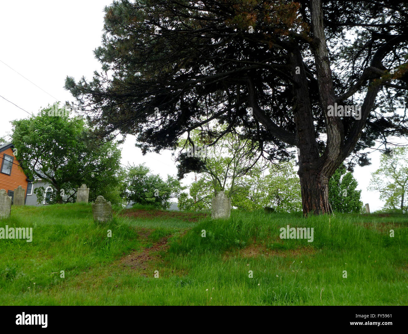 Historic Graveyard, The Burying Point, has been used since 1637, on a overcast wet day in Salem, Masachusetts Stock Photo