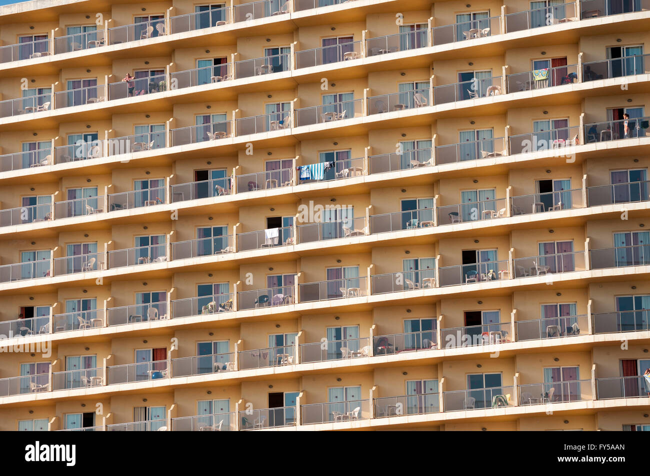Rows of balconies on the facade of a large hotel complex in Torremolinos, Costa del Sol, Spain Stock Photo