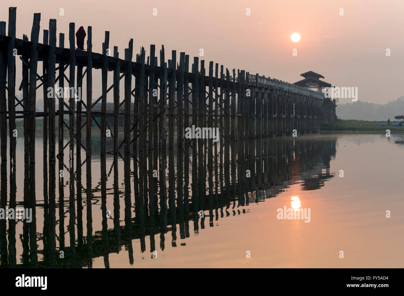 Sunrise over the U Bein Bridge crossing the Taungthaman Lake, the ...
