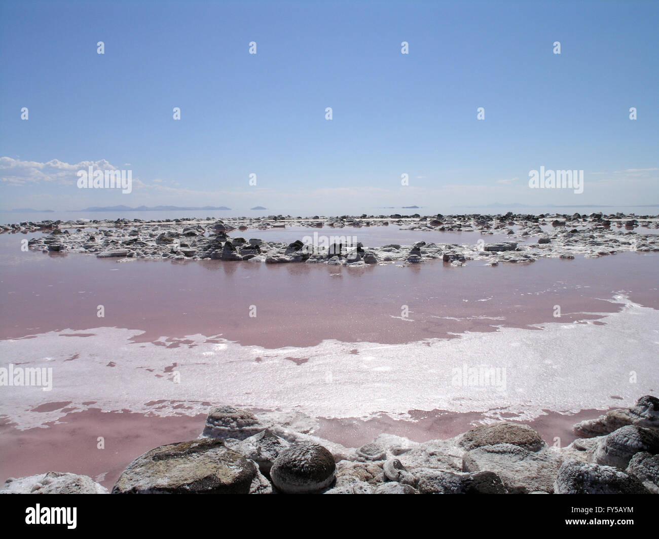 Spiral Jetty inner circles of spiral with bubbles in the pink water, Robert Smithson's masterpiece earthwork, on the north side Stock Photo